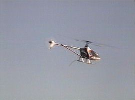 R/C Model Helicopter flying a circuit